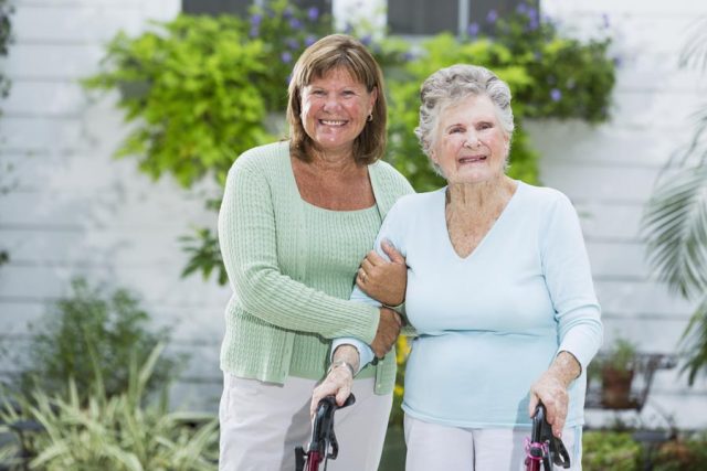 Elderly woman walking with adult caregiver utah advance directive instructions